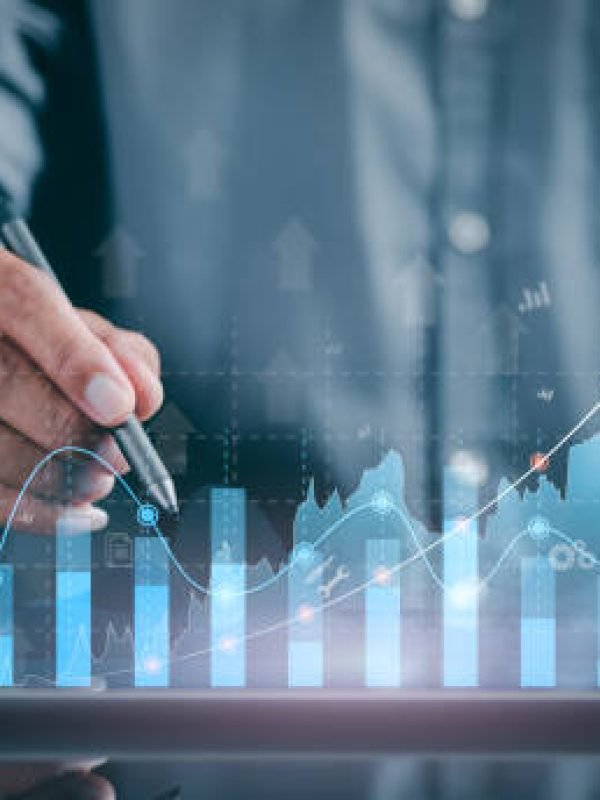 A marketer holds a pen pointing to a graph and shows SEO concepts, optimization analysis tools, search engine rankings, social media sites based on results analysis data.